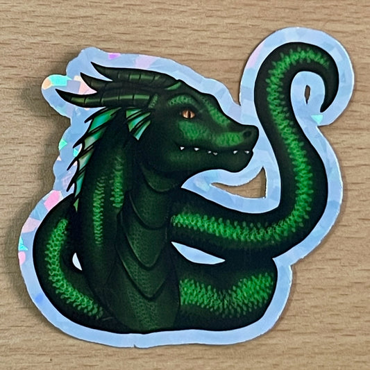 Holographic sticker image of Jormandr the dragon and his sentient tail.
